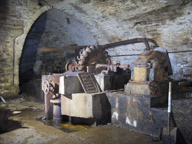 33_bs_compressor.jpg - View of the pelton wheel and compressor bed.