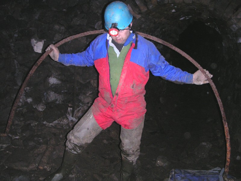 bh_arch_former_on_wellgillxvein.jpg - Charlie checking out an arch former along the Wellgill Cross Vein.