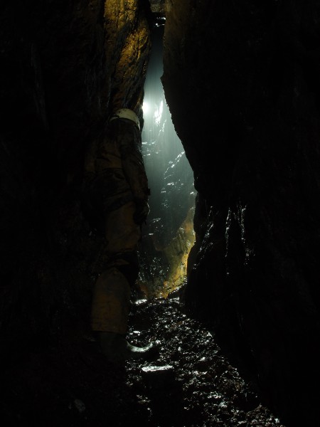P3108393.JPG - Pete looking down from the level in the wet rise.