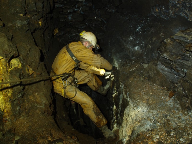 P3012556.JPG - Putting in anchors on the second pitch into jug Vein.