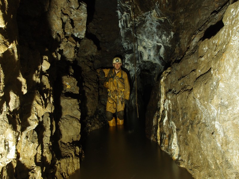 P1112238.JPG - In the Great Limestone on Jug Vein. Rope from the sump and High Level.