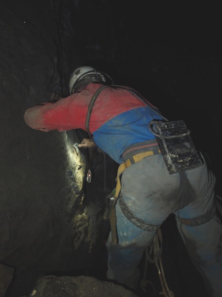 P8206613.JPG - Pete rigging a sump just before a big fall in the stope.