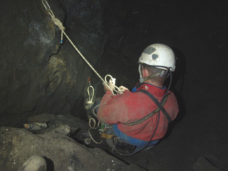 P8206618.JPG - Pete rigging a sump just before a big fall in the stope.