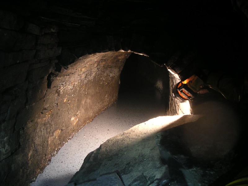 cc_horselevel_watercalcite1.jpg - Further in we came across this water covered in what we thought was some sort of scum. It turned out to be calcite crystals.