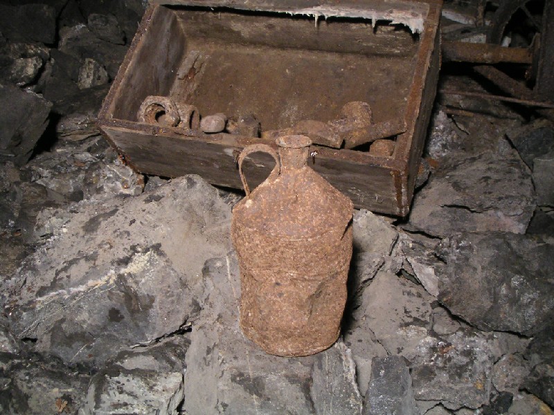 cc_mcnv_stope_metalcan.jpg - Close up of the box and metal container next to it.