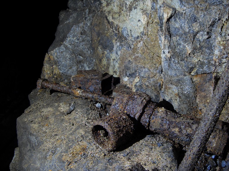 cc09_stope_tinsandfittings.jpg - Pipe fittings, tin and part of a drill steel.