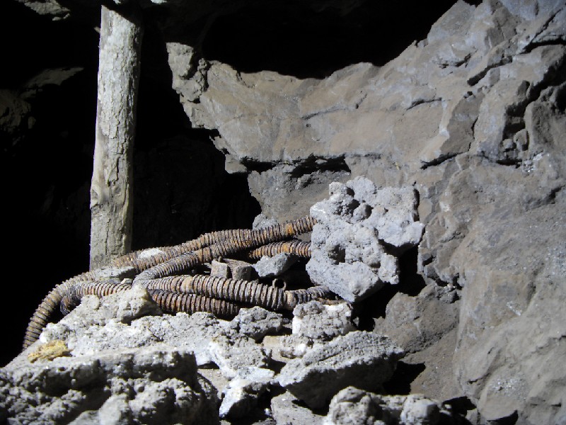 cc46_headingpassage_airhose3.jpg - Pieces of air hose on the bench.