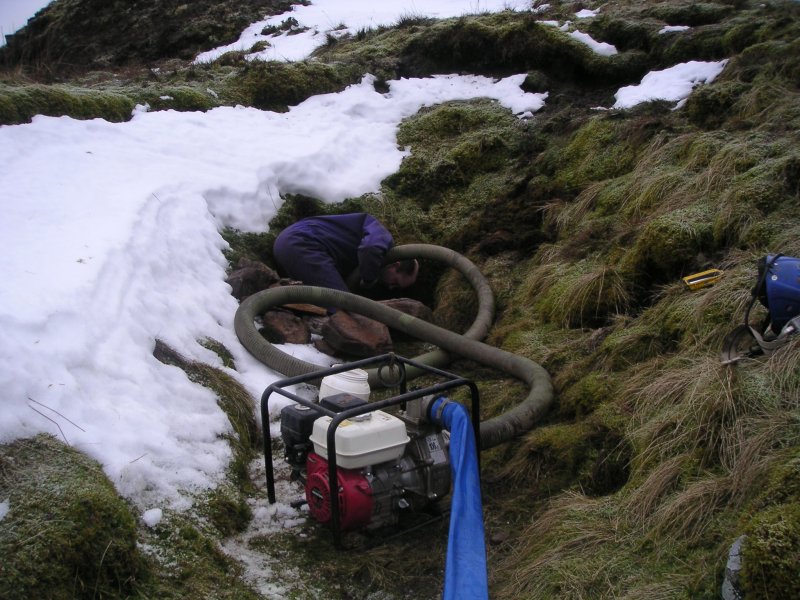 ccf_settingpumpup_2.jpg - Plumbing in the pump.