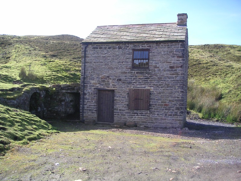 cch_mineworkshop1.jpg - The main adit and restored mine workshop.
