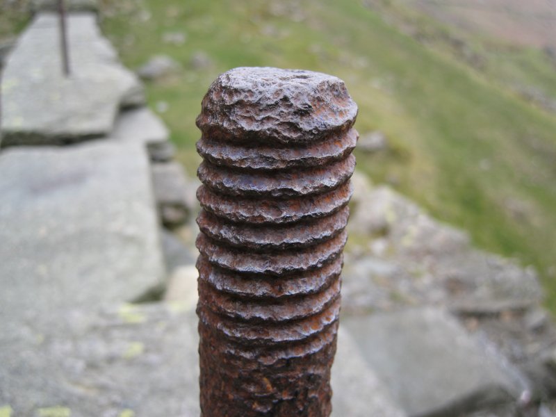 05_oes_threadedrod.jpg - One of the threaded rods on the wheel pit walls. Would this have been part of the mounting for the water wheel bearings?