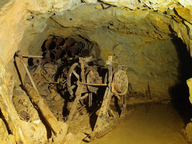 P6143312.JPG - Old winch and ventilation pipes on the 1100' Level.