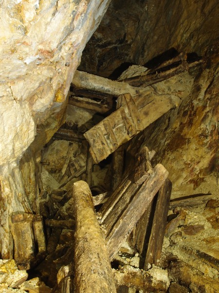 P6143324.JPG - Collapsed hopper and timber work in stope, 80' Level.