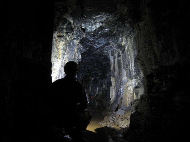 IMG_4451.JPG - View of a calcified section of level, with Helen in the background.