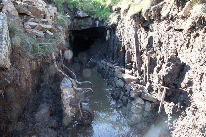 IMG_3613.jpg - Shoring up the culvert sides.