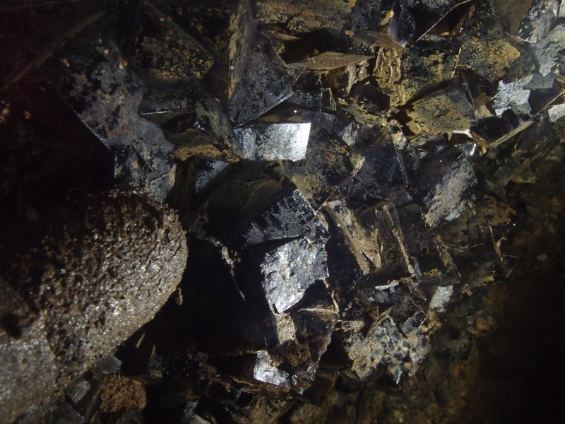 P1122408.JPG - Fluorite cubes in the roof. Gloved finger width 25mm.