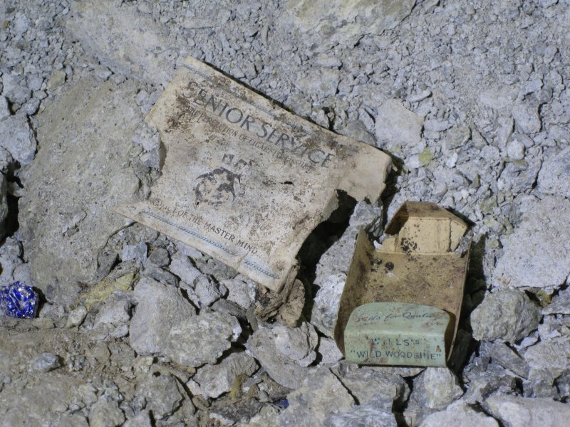 IMG_1912.jpg - Old cigarette wrappers and box, in a blind cross cut.