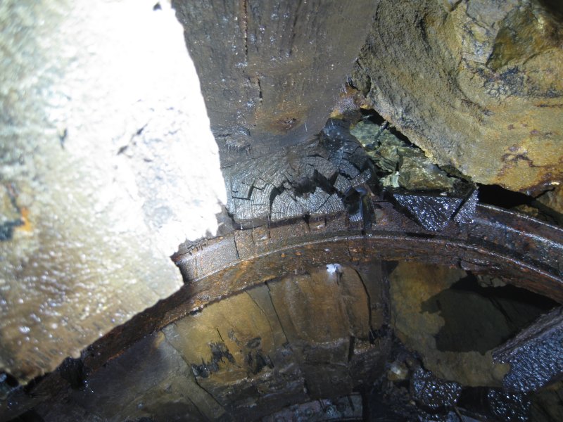 Img_3724.jpg - In one section of the level, there is a lot of pressure on the timbers. Here, though you cannot see it clearly the whole end is splintered like a exploded cigar in a cartoon.