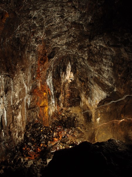 P2053292.JPG - View down the stope, looking outbye - 60s exposure with Karli walking to the sublevel (just a bit up from centre), about 150m away.