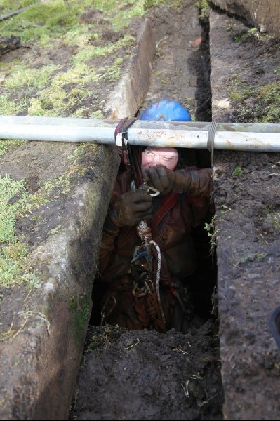 12_bhs_climbing_out2.jpg - Borehole Sump: Back out, and looking a bit more messy than before going down.