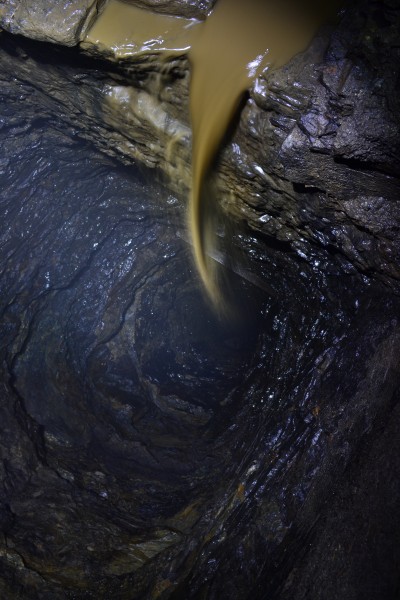 DSC_0586.JPG - Looking down the sump to the Four Fathom Limestone. Photo by Karli.