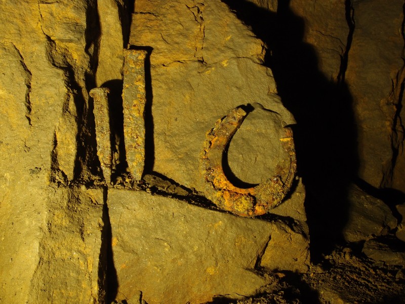 PC011932.JPG - Artifacts on a shelf, between the Three Way Junction and the Four Fathom Limestone sump.