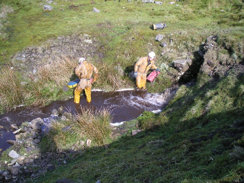 mc_chimpbathing.jpg - Cleaning up, by having a chimp bath.