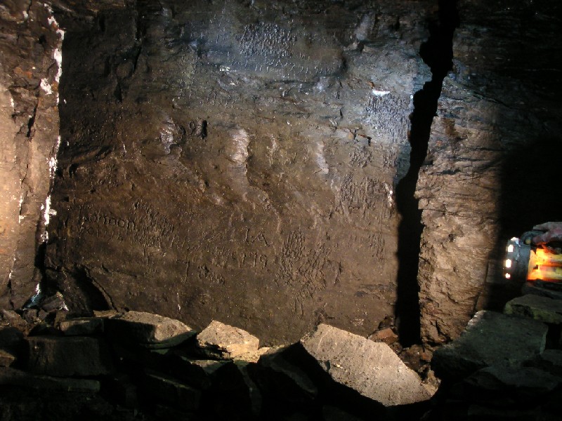 mc_mcnv_graffiti1.jpg - At the same sump, on another wall face, more graffiti can be seen, with the initials of Isaac Archer clearly visible.