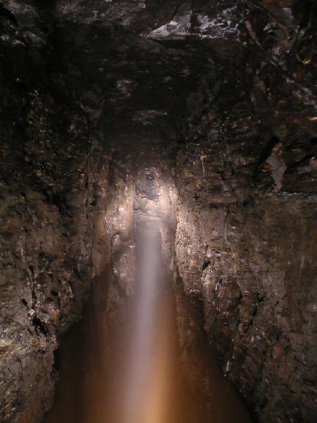 mc_viewtoportal.jpg - After returning to the main drive in from the first part of the explore, this was the view towards the portal. A splash of white in the distance is daylight.