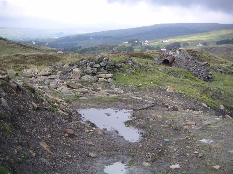 mc_waterpipe.jpg - Water pipe remains on top of the spoil heap.