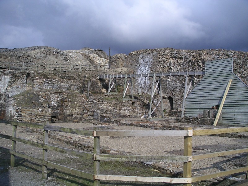 llc_smeltmill1.jpg - Enclosed view of the waterwheel and the leat that supplies water to it. This area was actually in the smelt mill.