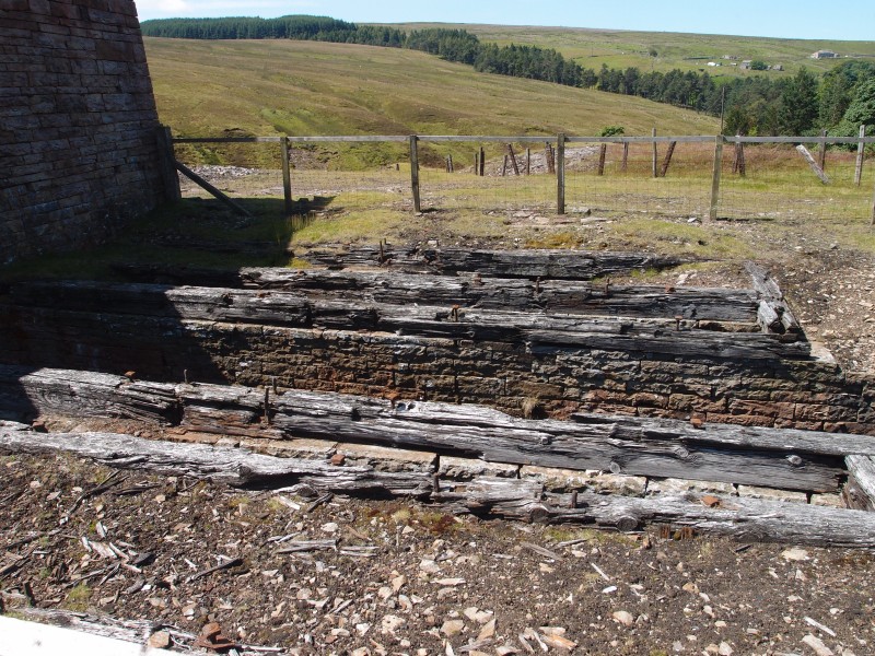 P7246221.JPG - Timber beds which would have supported the wheel structure.