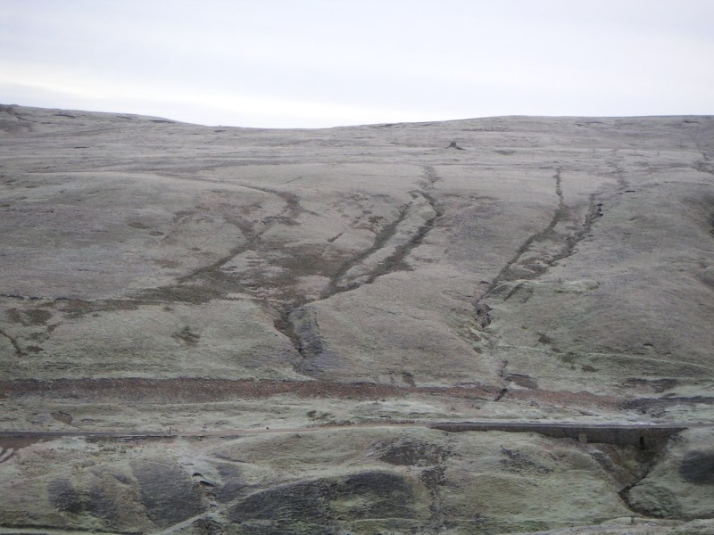 chimney.jpg - Looking east, the chimney for the exhaust gases from the smelt mill can be seen just below the horizon.
