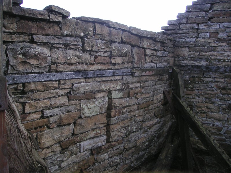 north_powder_house_3.jpg - The North Powder House. Inside the house would have been clad in timber, with no ferrous nails to avoid the possibility of sparks. In this case the cladding was 'nailed' with wooden pegs, which can still be seen.