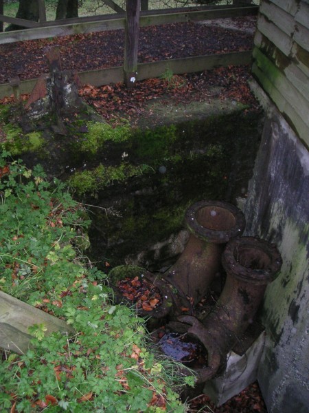 nsp_brewerypipes.jpg - Pipe remains outside the Brewery Shaft hut.