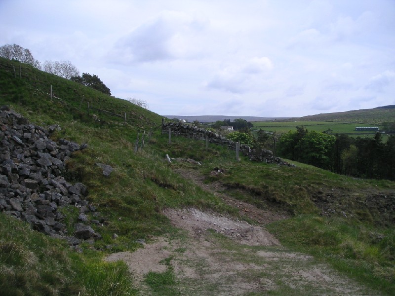 h_collapsed_surface_shaft.jpg - There is a depression in the fenced off area. We think that this is a collapsed shaft that has caused the fall in the level below.