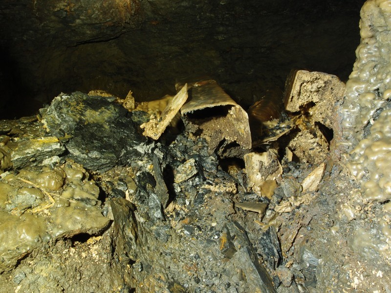 P8311038.JPG - Calcite covered timbers have rotted and left these calcite sections.