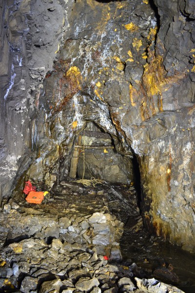 DSC_0150.JPG - Landing site into the stope. Note half buried barrow wheel in the bottom right. Photo by Karli.