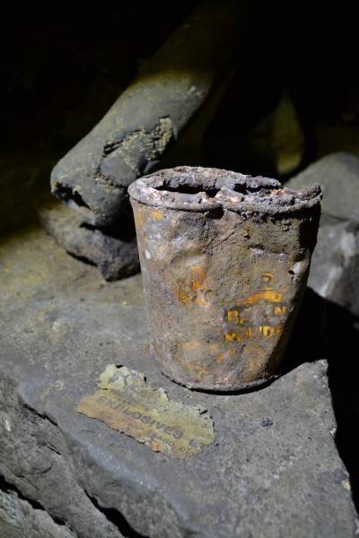 DSC_0292.JPG - Baking powder tin and explosives label. Photo by Karli.