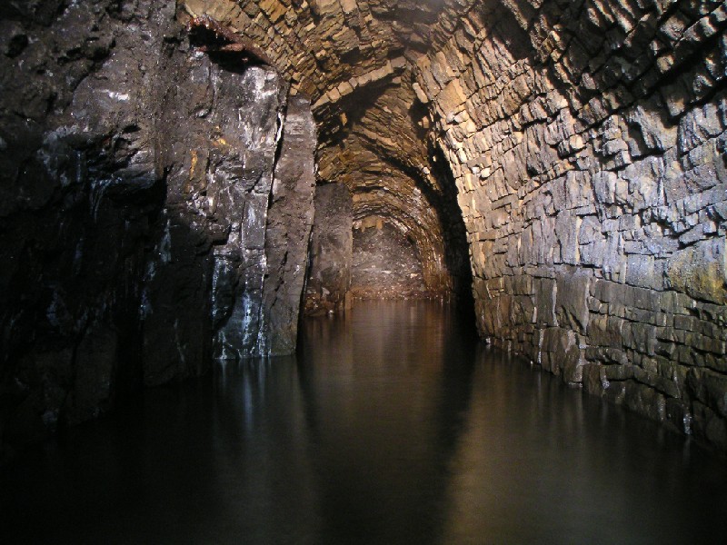 rg_hsb_firstsunviencollapse2.jpg - After visiting the calcite flows we returned to Charlie's Sump junction, and went along the drained passage. After 88m we reached this collapse, a big downer as we had hoped to reach the forehead here.