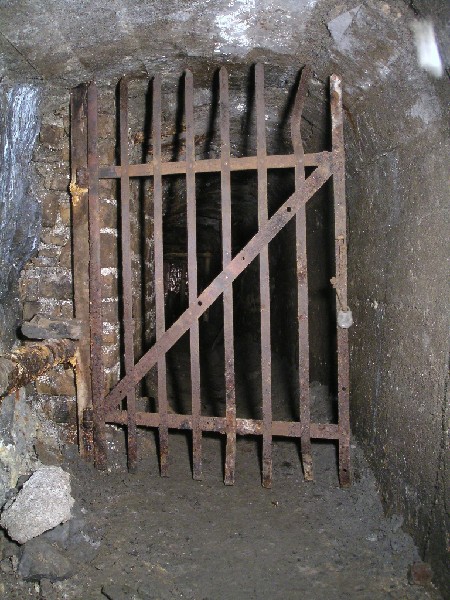 rg_countybordergate.jpg - Not far from Rampgill Shaft, further into the mine is the county boundary gate. On this side we are in Cumbria, on the other in Northumberland.