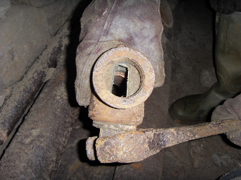 SDC10497.jpg - One of the pipe fittings in the stopes below the high flat. Here a valve is still in pretty much perfect condition, shiney brass and turning.