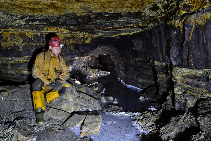 DSC_0390.JPG - Calcite on water, at a junction with a blind (right) level. Photo by Karli.