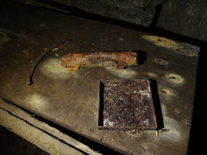 P4059980.JPG - Fuse, dynamite, and detoantor box lid. Photo by Mike.