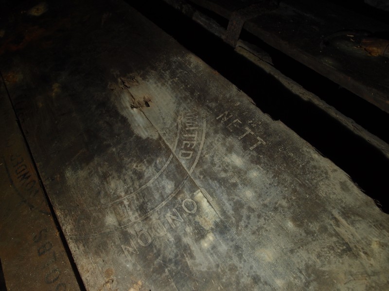 P4059981.JPG - Engraved lettering on the explosive boxes. Photo by Mike.