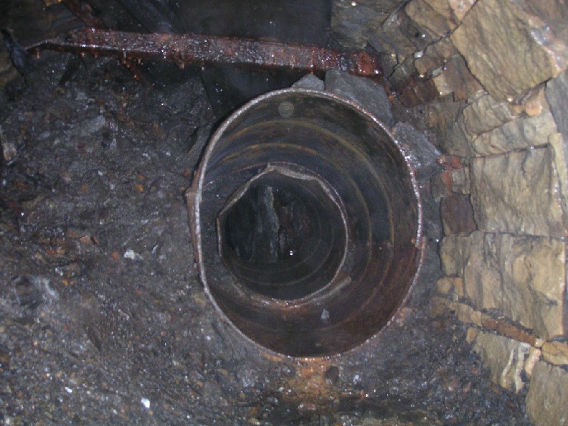 rg_scaleburn_oildrum_collapse.jpg - Past the previous collapse is another collapse, which is supported by oil drums.