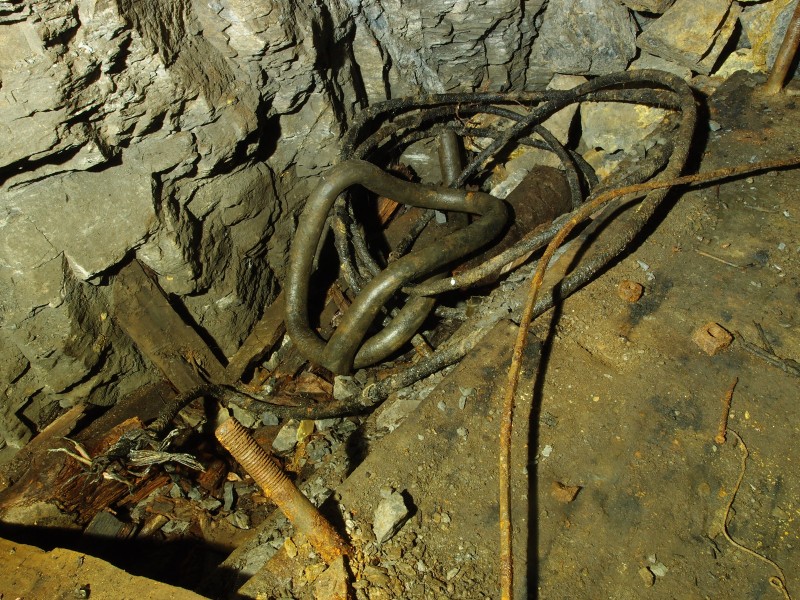 P5253085.JPG - Flexible piping and electrical cables near engine bed outside of No2 Shaft engine room.