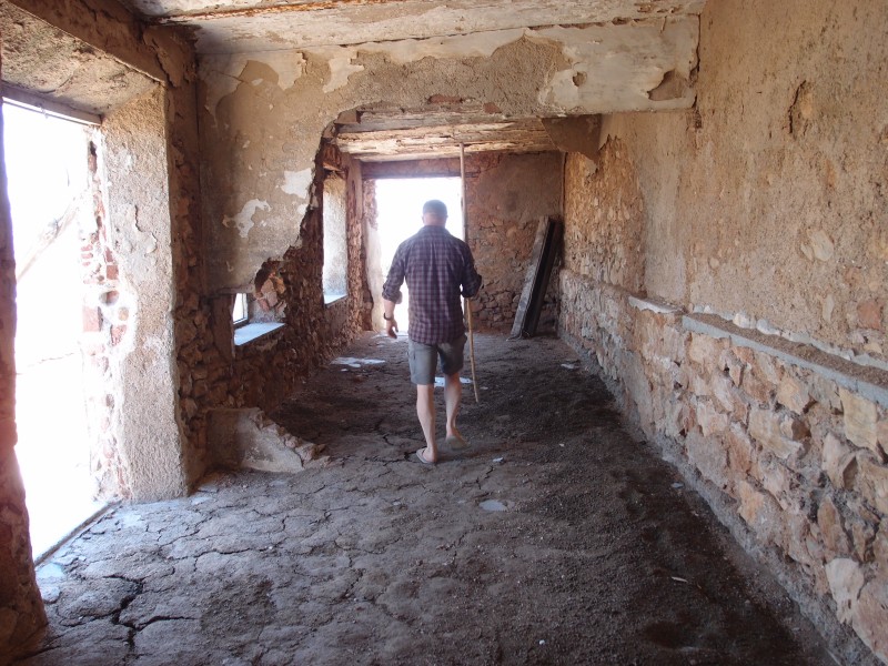 P6067821.JPG - Another old mine building, the floor is covered in sheep and bird...