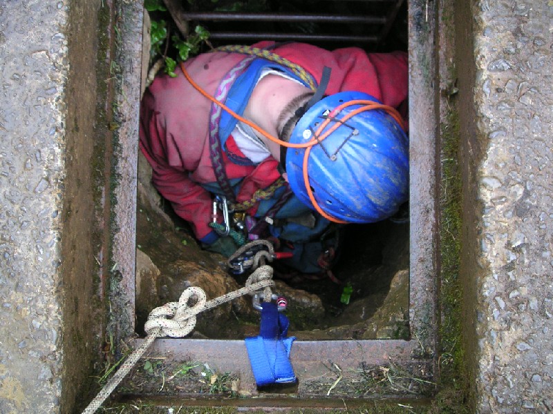 sr_goingdown.jpg - Rigged up and Mike just about to abseil down, the drop is only 10m.