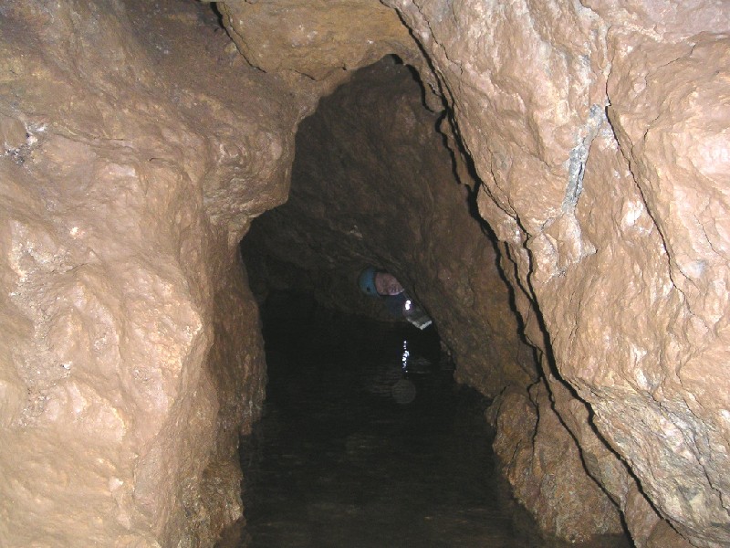 sr_streamgalleries.jpg - A nice pool in the Stream Galleries, there are many deep blue holes in this area which look really nice. Charlie poking his head out from a little sump, which he had to crawl through - Mike found the dry way round.