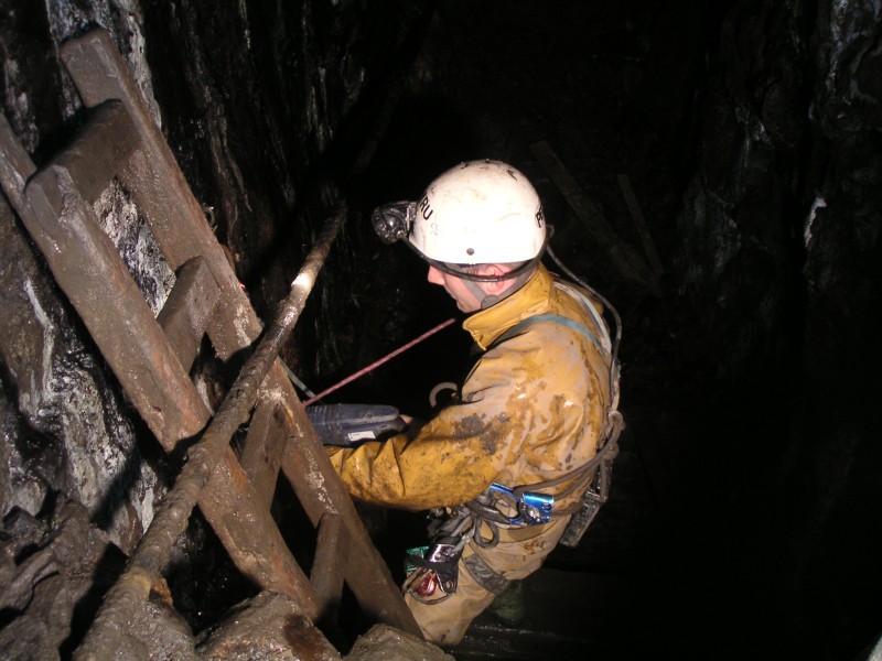 sc_rise_before_bogg_shaft.jpg - Karli installing a new anchor for the rise into the stope for by passing the Bogg Shaft collapse.